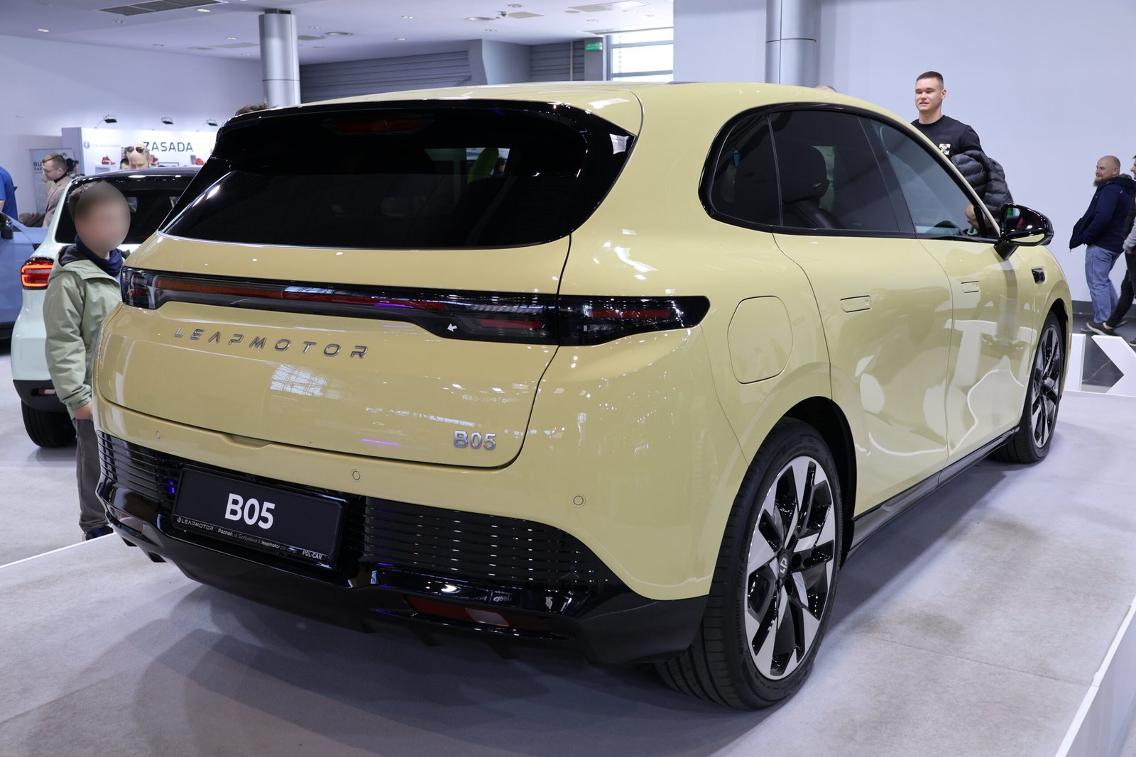 Yellow Leapmotor B05, rear three-quarter view at the 2026 Poznań Motor Show